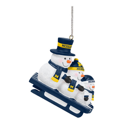 Michigan Wolverines Snowman Sledding Family Holiday Ornament In White - Side View 2