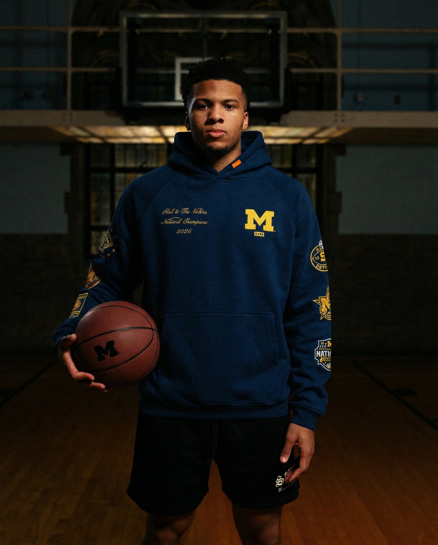 Michigan Wolverines Men's Basketball National Champions Navy Collector's Hoodie - Front Model View